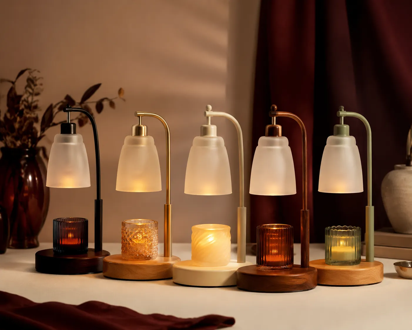 Candle warmer lamps lined up in five finishes