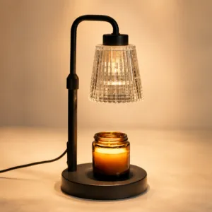BeginLighting classic arch candle warmer lamp glowing warmly with an amber candle