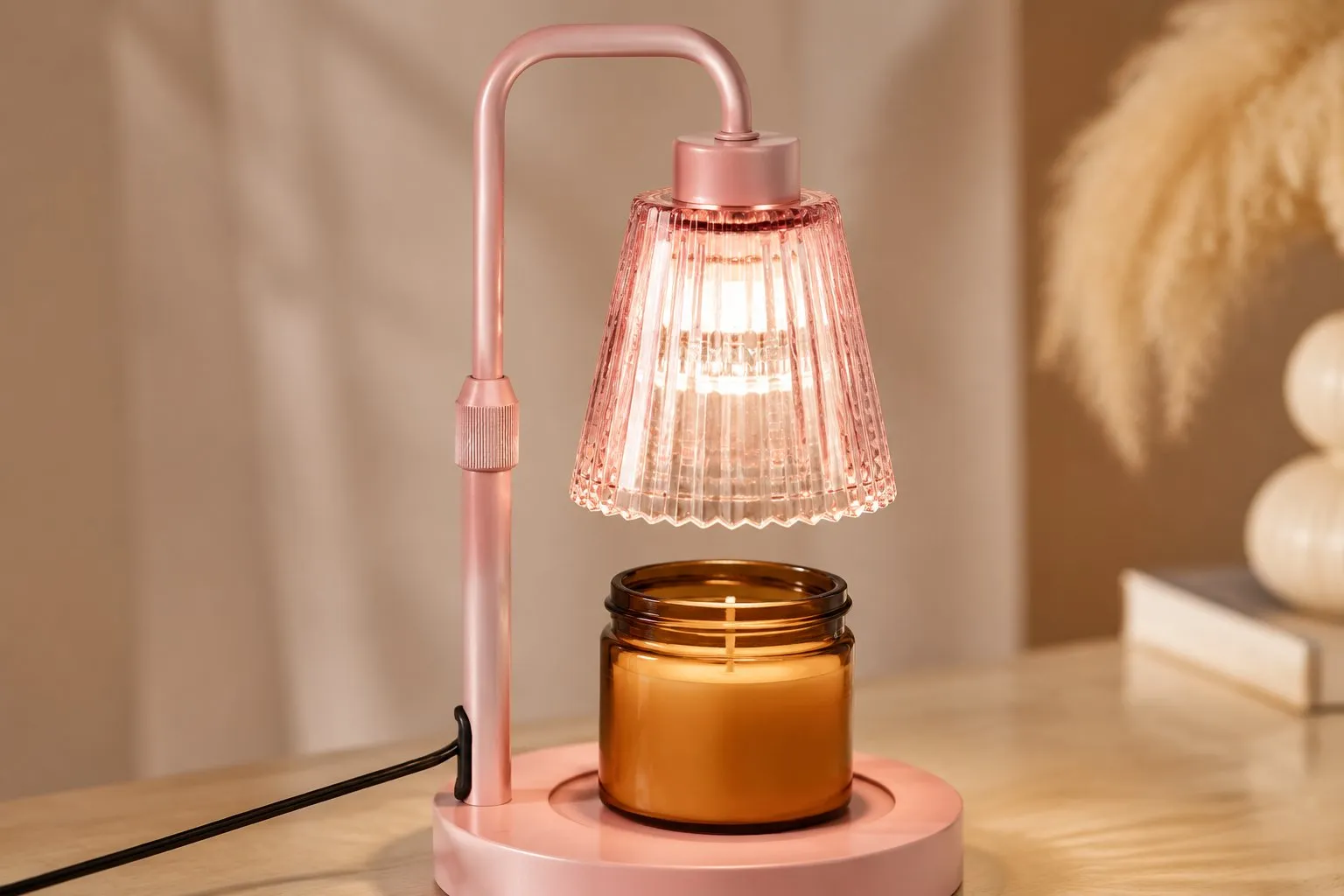 Blush-pink candle warmer lamp shown close up, highlighting the glass shade and powder-coated steel base BeginLighting builds factory-direct