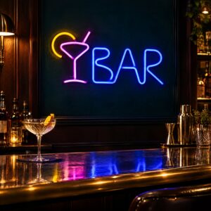 Custom LED neon bar sign with a pink cocktail glass, yellow lemon slice and blue BAR lettering above a bar counter