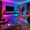 Smart RGB LED strip lighting in a living-room ceiling cove, TV wall and under the sofa, with a phone app and remote